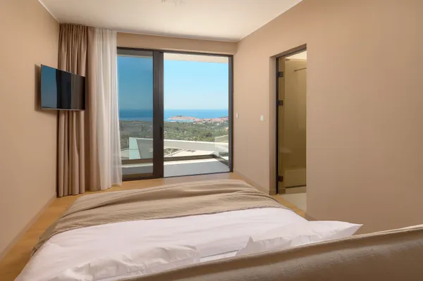 Bedroom with ensuite and sea view