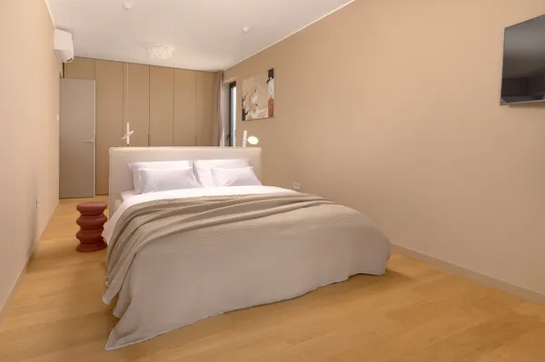 Bedroom with king bed and closet